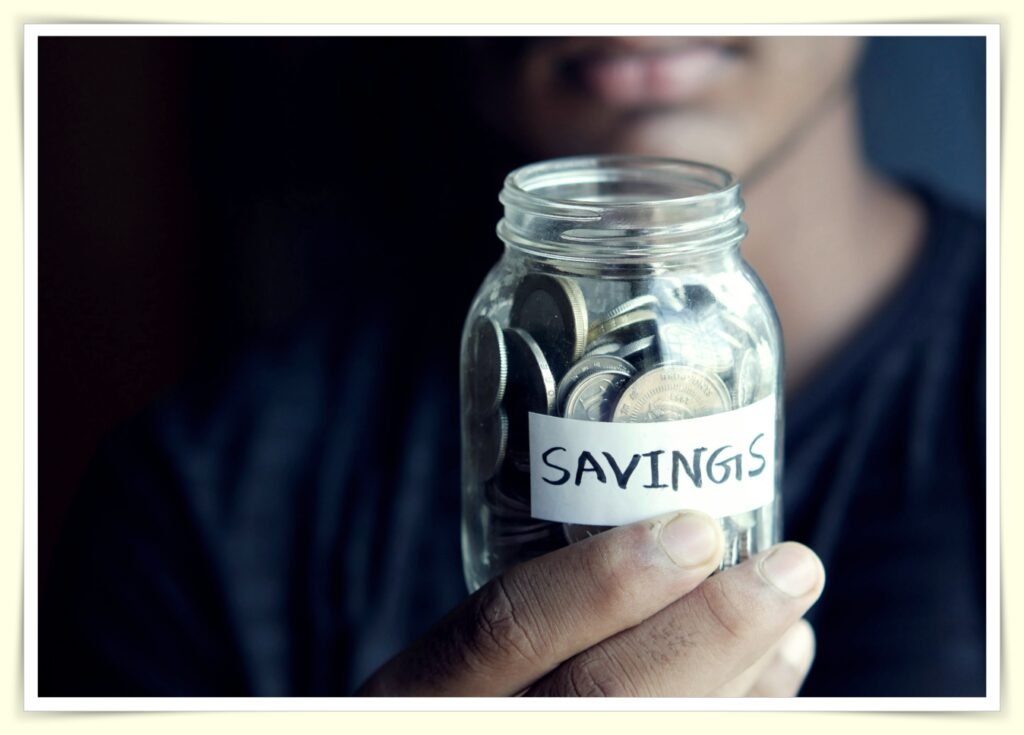 person working on a laptop to earn extra income on side