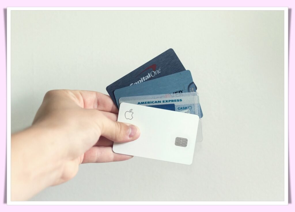 person managing credit card debt and savings