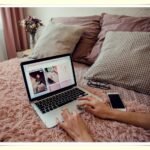 freelancer working at home office desk budgeting income and expenses
