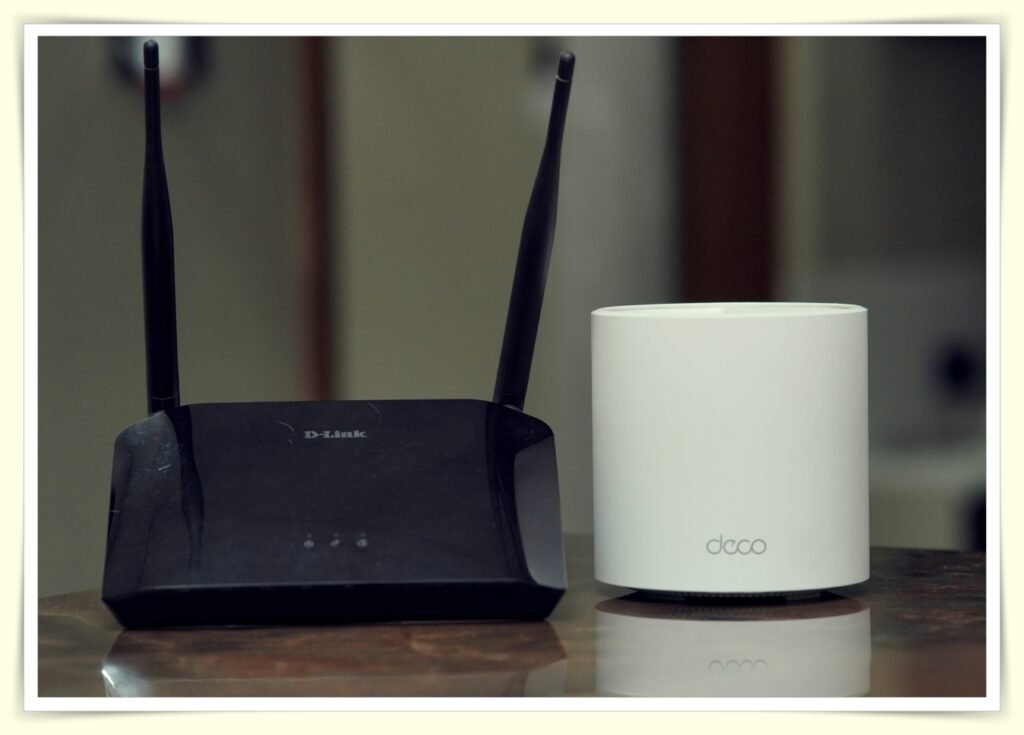 wifi router on home office desk representing internet bill