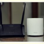 wifi router on home office desk representing internet bill