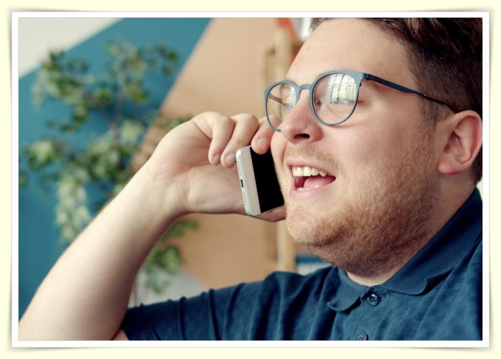 person on phone negotiating internet bill rate with provider