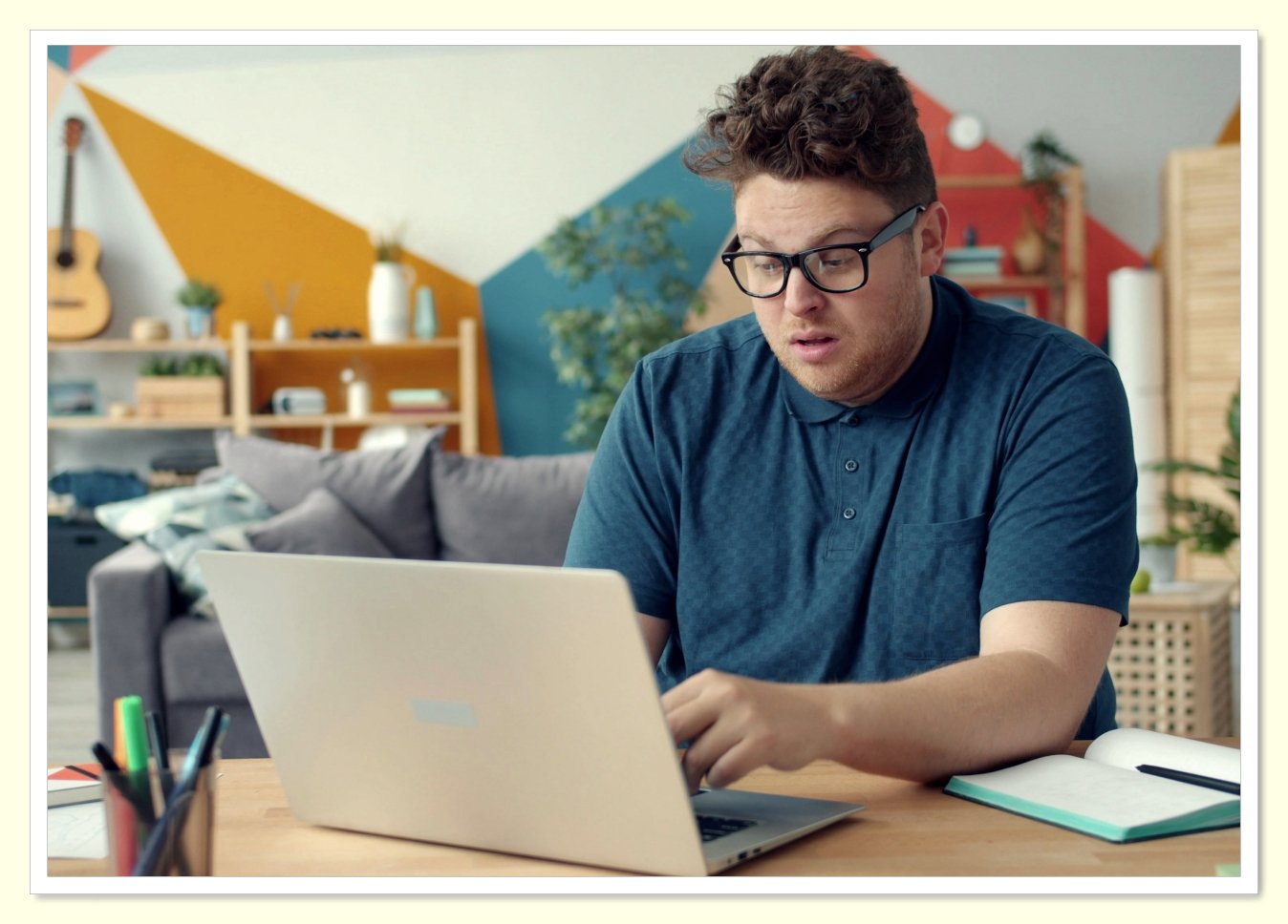 person reviewing monthly bills on laptop at home to cut expenses
