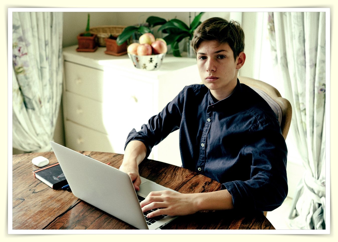 young adult reviewing retirement investment account on laptop
