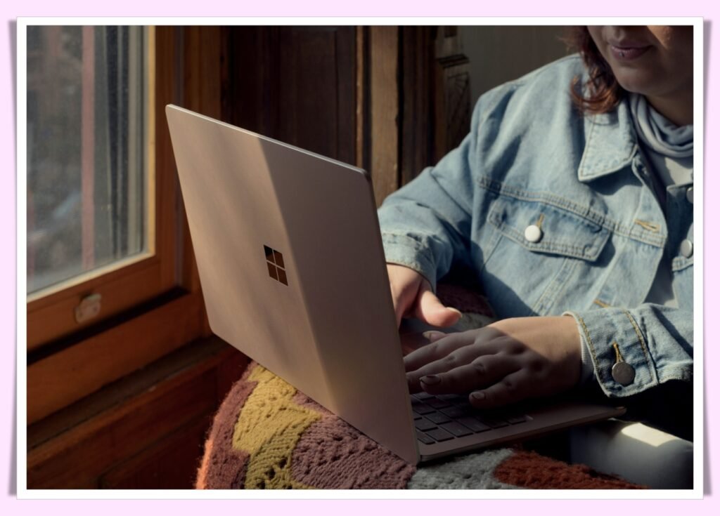 person opening Roth IRA account on laptop 