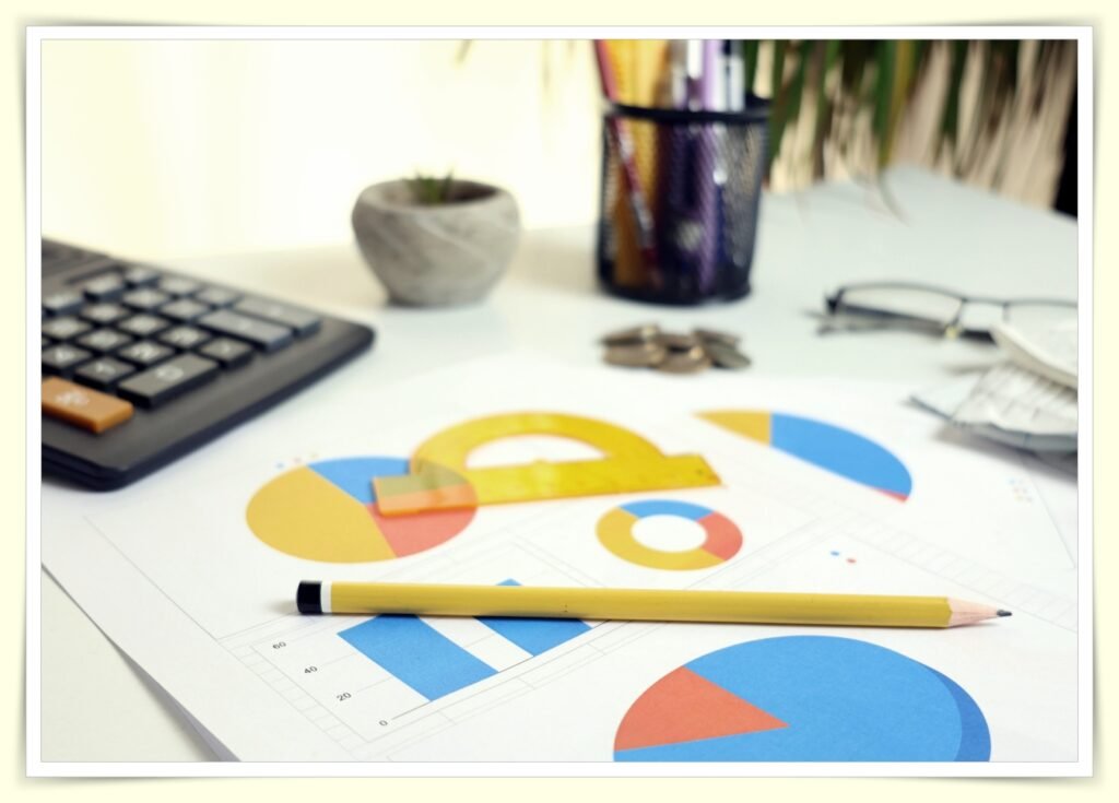 person working on laptop to earn side income and save more 