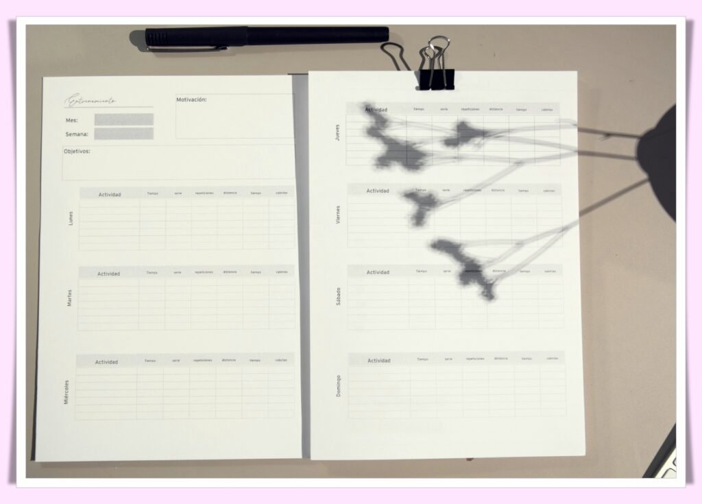 person creating weekly budget on spreadsheet